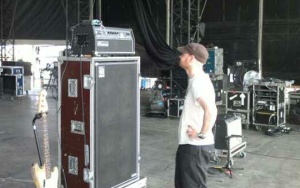 Colin squares up to a bass amp during soundcheck